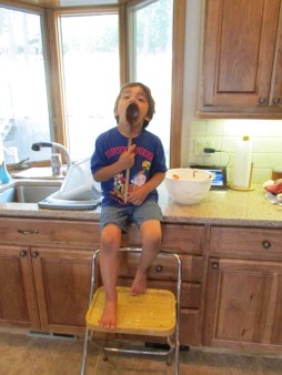 Helping to make brownies.