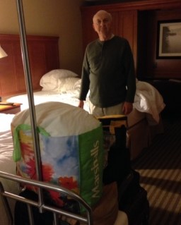 Banjo Man packs up his stuff for the last day on the road.